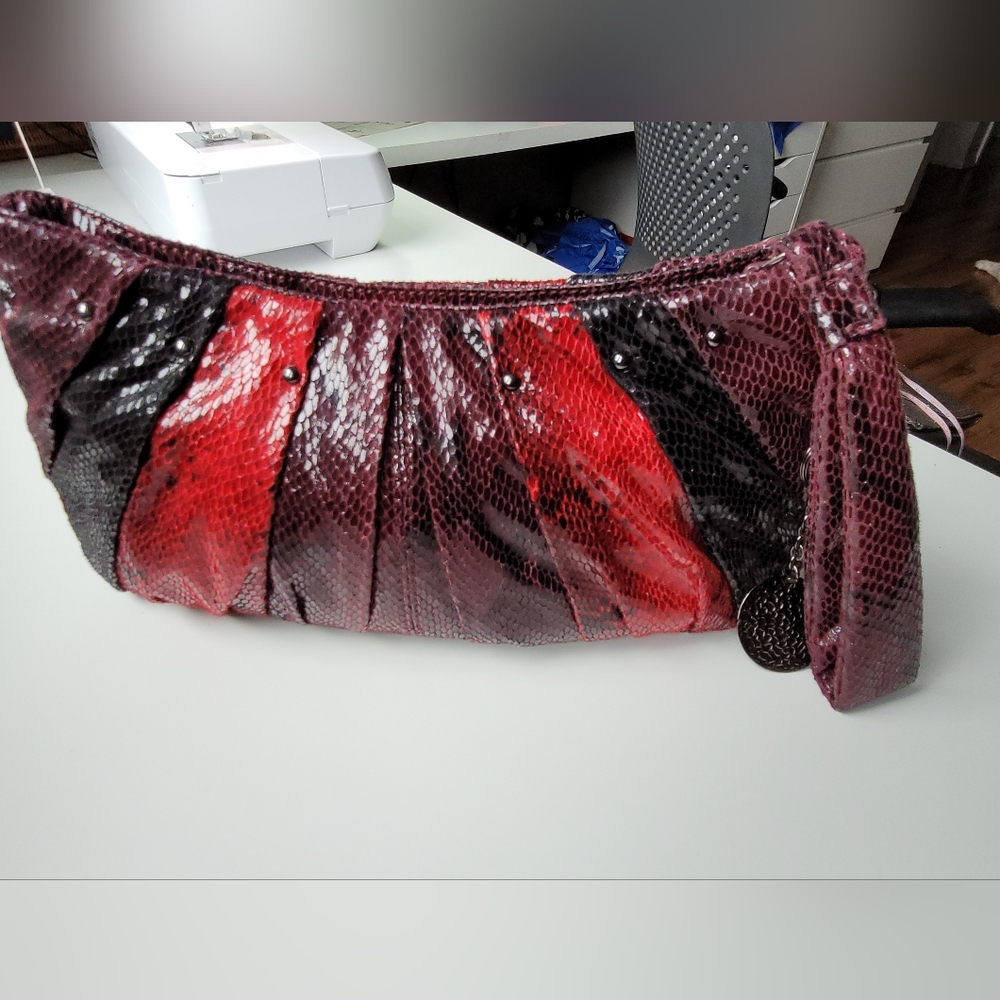 Nine West clutch in red, burgundy and purple